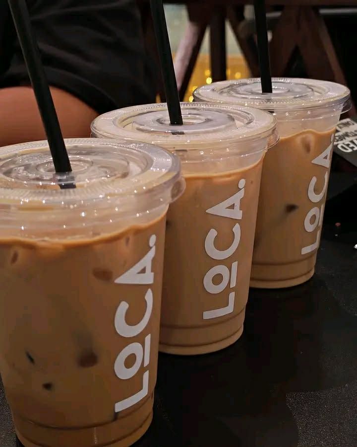 Loca iced coffee in hand